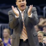 Phoenix Mercury head coach Russ Pennell yells from the bench against the Los Angeles Sparks during the first half of Game 2 of a WNBA basketball Western Conference semifinal series, Saturday, Sept. 21, 2013, in Phoenix. (AP Photo/Matt York)