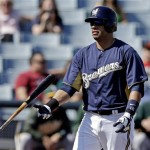 Milwaukee Brewers' Aramis Ramirez flips his bat after striking out during the first inning of an exhibition spring training baseball game against the Oakland Athletics Saturday, Feb. 23, 2013, in Phoenix. (AP Photo/Morry Gash)
