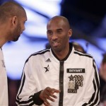 West Team's Tim Duncan of the San Antonio Spurs, left, and Kobe Bryant of the Los Angeles Lakers before the NBA All-Star basketball game Sunday, Feb. 17, 2013, in Houston. (AP Photo/Eric Gay)