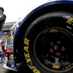 Jimmie Johnson, right, and crew chief Chad Knaus stand in front of Johnson's car before the NASCAR Sprint Cup Series auto race Sunday, March 3, 2013, in Avondale, Ariz. (AP Photo/Ross D. Franklin)