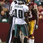  An official tries to separate Philadelphia Eagles receiver DeSean Jackson (10) and Washington Redskins corner DeAngelo Hall after the two were involved in a sideline altercation during an NFL football game, Monday, Sept. 9, 2013, in Landover, Md. (AP Photo/The Wilmington News-Journal, Andre L. Smith) NO SALES.