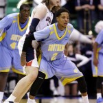 Southern University's Derick Beltran (2) guards Gonzaga's Kelly Olynyk, rear, in the second half during a second-round game in the NCAA college basketball tournament in Salt Lake City, Thursday, March 21, 2013. Gonzaga won 64-58. (AP Photo/Rick Bowmer)
