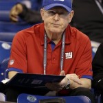 New York Giants head coach Tom Coughlin watch drills at the NFL football scouting combine in Indianapolis, Sunday, Feb. 24, 2013. (AP Photo/Michael Conroy)