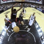 Miami Heat's Chris Bosh (1) dunks against the San Antonio Spurs during the first half at Game 4 of the NBA Finals basketball series, Thursday, June 13, 2013, in San Antonio. (AP Photo/Lucy Nicholson, Pool)