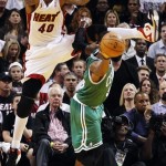 Miami Heat's Udonis Haslem (40) defends against Boston Celtics' Rajon Rondo (9) during the first half of an NBA basketball game, Tuesday, Oct. 30, 2012, in Miami. (AP Photo/J Pat Carter)