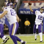 Minnesota Vikings quarterback Josh Freeman (12) throws a pass during the first half of an NFL football game against the New York Giants Monday, Oct. 21, 2013 in East Rutherford, N.J. (AP Photo/Julio Cortez)