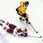  Phoenix Coyotes right wing Mikkel Boedker (89), of Denmark, dives for the puck as Nashville Predators forward Matt Cullen (7) chases after it in the second period of an NHL hockey game Monday, Nov. 25, 2013, in Nashville, Tenn. (AP Photo/Mark Humphrey)