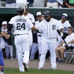 Detroit Tigers' Prince Fielder, right, greets third baseman Miguel Cabrera (24) after his home run during the third inning of an exhibition spring training baseball game against the Toronto Blue Jays, Saturday, Feb. 23, 2013, in Lakeland, Fla. (AP Photo/Charlie Neibergall)

