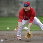 Philadelphia Phillies' Chase Utley fields a grounder during a workout at baseball spring training, Thursday, Feb. 14, 2013, in Clearwater, Fla. (AP Photo/Matt Slocum)