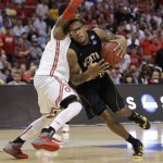 Ohio State forward Deshaun Thomas, left, defends against Wichita State forward Carl Hall during the second half of the West Regional final in the NCAA men's college basketball tournament, Saturday, March 30, 2013, in Los Angeles. (AP Photo/Jae C. Hong)