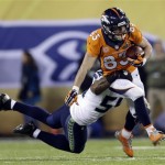 Denver Broncos' Wes Welker (83) is tackled by Seattle Seahawks' Bobby Wagner during the second half of the NFL Super Bowl XLVIII football game Sunday, Feb. 2, 2014, in East Rutherford, N.J. (AP Photo/Jeff Roberson)