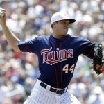 Minnesota Twins pitcher Kyle Gibson throws against the New York Yankees in the first inning of a baseball game, Thursday, July 4, 2013, in Minneapolis. (AP Photo/Jim Mone)