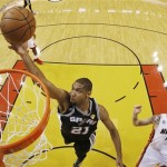 San Antonio Spurs power forward Tim Duncan (21) shoots against Miami Heat shooting guard Mike Miller (13) during the second half of Game 6 in the NBA Finals basketball series, Wednesday, June 19, 2013 in Miami. (AP Photo/Kevin C. Cox, Pool)