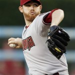 Arizona Diamondbacks starter Ian Kennedy pitches to the Los Angeles Dodgers in the first inning of a baseball game in Los Angeles Monday, May 14, 2012. (AP Photo/Reed Saxon)