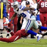Dallas Cowboys running back DeMarco Murray (29) is tackled by Arizona Cardinals cornerback Patrick Peterson during the first half of an NFL football game, Sunday, Dec. 4, 2011, in Glendale, Ariz. (AP Photo/Ross D. Franklin)