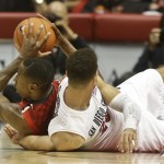  Arizona forward Rondae Hollis-Jefferson beats San Diego State 's JJ O'Brien for a loose ball during the second half of Arizona's 69-60 victory in a NCAA college basketball game Thursday, Nov. 14, 2013, in San Diego. (AP Photo/Lenny Ignelzi)