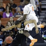  Illinois' Sam McLaurin (0) crashes into Colorado's Josh Scott (40) during the first half of a second-round game of the NCAA college basketball tournament on Friday, March 22, 2013, in Austin, Texas. (AP Photo/David J. Phillip)
