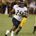  Northern Arizona running back Covaughn DeBoskie-Johnson runs for a first down against Arizona State during the first half of a football game on Thursday, Aug. 30 2012, in Tempe, Ariz. (AP Photo/Rick Scuteri)