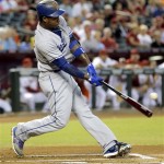 Los Angeles Dodgers' Hanley Ramirez connects for a single during the first inning of a baseball game against the Arizona Diamondbacks, Tuesday, Sept. 17, 2013, in Phoenix. (AP Photo/Matt York)