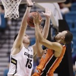 Oregon State's Roberto Nelson (55) is fouled by Colorado's Shane Harris-Tunks while shooting in the second half during a Pac-12 tournament NCAA college basketball game on Wednesday, March 13, 2013, in Las Vegas. Colorado won 74-68. (AP Photo/Julie Jacobson)