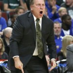 Michigan State coach Tom Izzo yells at his team during the first half of an NCAA college basketball game against Kentucky on Tuesday, Nov. 12, 2013, in Chicago. (AP Photo/Charles Rex Arbogast)