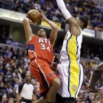 Atlanta Hawks guard Devin Harris (34) is fouled by Indiana Pacers forward Gerald Green in the first half of Game 2 of a first-round NBA basketball playoff series in Indianapolis, Wednesday, April 24, 2013. (AP Photo/Michael Conroy)