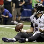 Baltimore Ravens quarterback Joe Flacco (5) sits on the field after being sacked by San Francisco 49ers' Ahmad Brooks during the second half of the NFL Super Bowl XLVII football game, Sunday, Feb. 3, 2013, in New Orleans. (AP Photo/Julio Cortez)