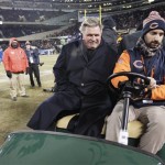 Former Chicago Bears player and football coach Mike Ditka arrives on the field for a halftime ceremony where his No. 89 was to be retired by the team during an NFL football game between the Bears and the Dallas Cowboys, Monday, Dec. 9, 2013, in Chicago. (AP Photo/Nam Y. Huh)