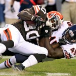  Chicago Bears linebacker Xavier Adibi (45) tackles Cleveland Browns running back Montario Hardesty in the first quarter of a preseason NFL football game Thursday, Aug. 30, 2012, in Cleveland. (AP Photo/Tony Dejak)