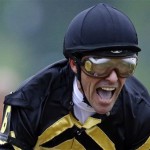 Jockey Gary Stevens celebrates after riding Oxbow to win the 138th Preakness Stakes horse race at Pimlico Race Course, Saturday, May 18, 2013, in Baltimore. (AP Photo/Patrick Semansky)
