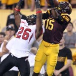 Utah defensive back Ryan Lacy, left, tips the ball away from Arizona State wide receive Rashad Ross, right, in the second quarter of a college football game, Saturday, Sept. 22, 2012, in Tempe, Ariz.(AP Photo/Paul Connors)
