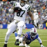 New York Jets tight end Jeff Cumberland (87) scores a touchdown in front of Buffalo Bills free safety Aaron Williams (23) during the second half of an NFL football game on Sunday, Nov. 17, 2013, in Orchard Park, N.Y. (AP Photo/Gary Wiepert)