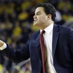  Arizona head coach Sean Miller directs his team from the sidelines during the first half of an NCAA college basketball game against Michigan in Ann Arbor, Mich., Saturday, Dec. 14, 2013. (AP Photo/Carlos Osorio)