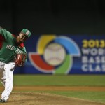 Mexico's Yovani Gallardo throws a pitch against the United States in the first inning during a World Baseball Classic baseball game on Friday, March 8, 2013, in Phoenix. (AP Photo/Ross D. Franklin)