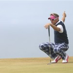 Ian Poulter of England gestures before putting on the 11th green during the final round of the British Open Golf Championship at Muirfield, Scotland, Sunday, July 21, 2013. (AP Photo/Scott Heppell)