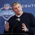 Tennessee Titans head coach Mike Munchak answers a question during a news conference at the NFL football scouting combine in Indianapolis, Thursday, Feb. 21, 2013. (AP Photo/Michael Conroy)