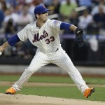 National League's Matt Harvey, of the New York Mets, pitches during the first inning of the MLB All-Star baseball game, on Tuesday, July 16, 2013, in New York. (AP Photo/Kathy Willens)