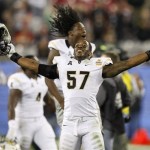 Central Florida linebacker Troy Gray (57) celebrates as time expires after the Fiesta Bowl NCAA college football game against Baylor, Wednesday, Jan. 1, 2014, in Glendale, Ariz. Central Florida won 52-42. (AP Photo/Rick Scuteri)
