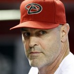 Arizona Diamondbacks manager Kirk Gibson looks on in the first inning during a baseball game against the Cincinnati Reds, Friday, June. 21, 2013, in Phoenix. (AP Photo/Rick Scuteri)
