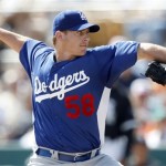Los Angeles Dodgers' Chad Billingsley delivers a pitch against the Chicago White Sox in the first inning of a spring training baseball game Monday, March 5, 2012, in Glendale, Ariz. (AP Photo/Paul Connors)