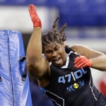 Arizona State defensive lineman Will Sutton runs a drill at the NFL football scouting combine in Indianapolis, Monday, Feb. 24, 2014. (AP Photo/Michael Conroy)