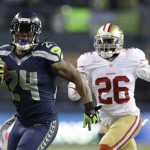  Seattle Seahawks' Marshawn Lynch (24) breaks away from San Francisco 49ers' Tramaine Brock (26) for a touch-down run during the second half of the NFL football NFC Championship game, Sunday, Jan. 19, 2014, in Seattle. (AP Photo/Elaine Thompson)