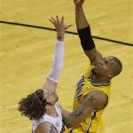 Indiana Pacers power forward David West (21) shoots over Miami Heat shooting guard Mike Miller (13) during the second half of Game 7 in their NBA basketball Eastern Conference finals playoff series, Monday, June 3, 2013 in Miami. (AP Photo/Wilfredo Lee)
