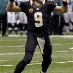 New Orleans Saints quarterback Drew Brees (9) throws a touchdown pass during the first half of an NFL football game against the Philadelphia Eagles at Mercedes-Benz Superdome in New Orleans, Monday, Nov. 5, 2012. (AP Photo/Bill Haber)