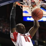 Louisville center Gorgui Dieng (10) scores against Colorado State in the first half of a third-round NCAA college basketball tournament game on Saturday, March 23, 2013, in Lexington, Ky. (AP Photo/James Crisp)
