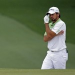 Jason Day, of Australia, reacts after hitting his second shot into a bunker on the seventh hole during the fourth round of the Masters golf tournament Sunday, April 14, 2013, in Augusta, Ga. (AP Photo/David J. Phillip)