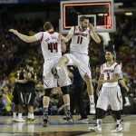 Louisville's Luke Hancock (11) Louisville's Peyton Siva (3) and Louisville's Stephan Van Treese (44) react after the second half of the NCAA Final Four tournament college basketball semifinal game against Wichita State Saturday, April 6, 2013, in Atlanta. Louisville won 72-68. (AP Photo/John Bazemore)
