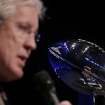  Seattle Seahawks head coach Pete Carroll speaks at a news conference Friday, Jan. 31, 2014, in New York as he sits next to the Vince Lombardi Trophy. The Seahawks are scheduled to play the Denver Broncos in the NFL Super Bowl XLVIII football game on Sunday, Feb. 2, at MetLife Stadium in East Rutherford, N.J. (AP Photo/Charlie Riedel)