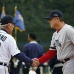  Detroit Tigers manager Jim Leyland shakes hands with Boston Red Sox manager John Farrell during the introduction before Game 3 of the American League baseball championship series Tuesday, Oct. 15, 2013, in Detroit. (AP Photo/Paul Sancya)