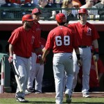 Los Angeles Angels' Efren Navarro (68) is congratulated by Carlos Ramirez, left, after scoring in the fourth inning of an exhibition spring training baseball game against the San Francisco Giants Saturday, Feb. 23, 2013, in Scottsdale, Ariz. (AP Photo/Darron Cummings)
